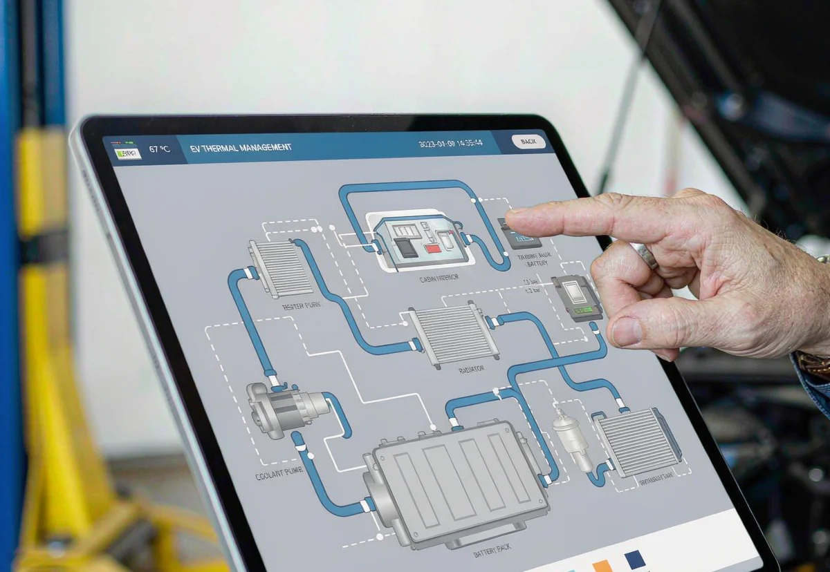 EV thermal management cooling loop diagram shown on a workshop tablet